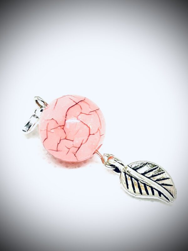 charm pink bead with feather